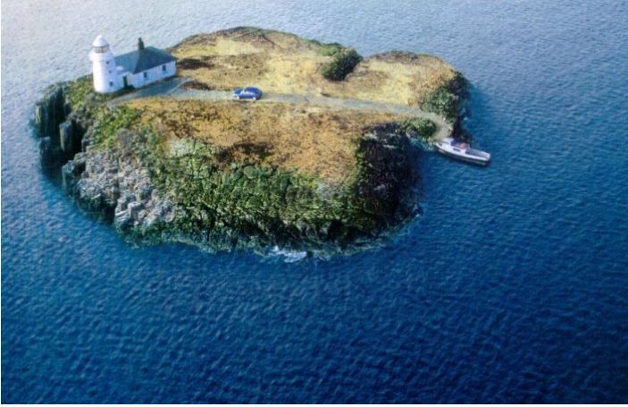 VW on a island with a Lighthouse